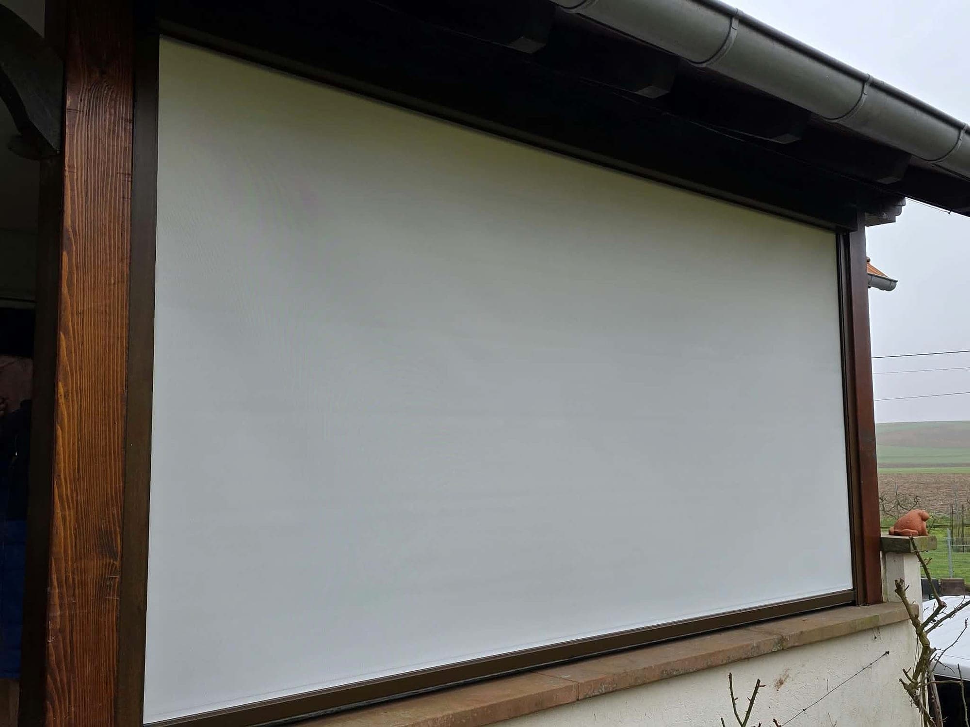 Baie coulissante alu marron et screen zip à Hoffen — Fenêtres Glineur